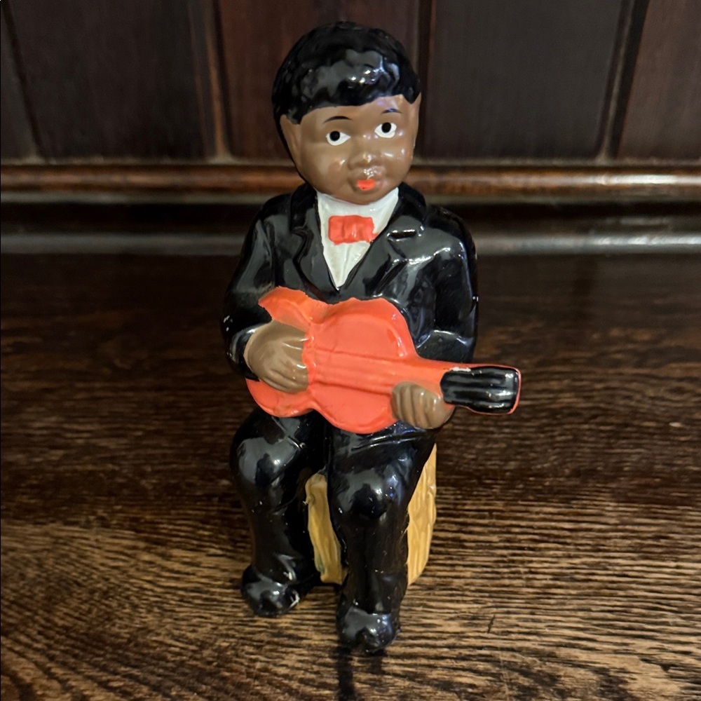 Ceramic Musician Figurine with Red Guitar